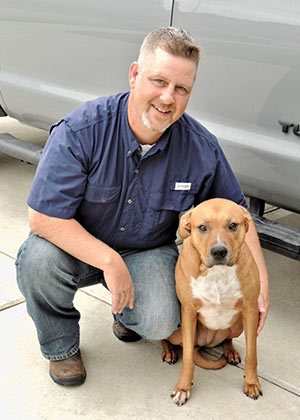 Scott Crowers from Ridgeback Inspections with his dog, Riley